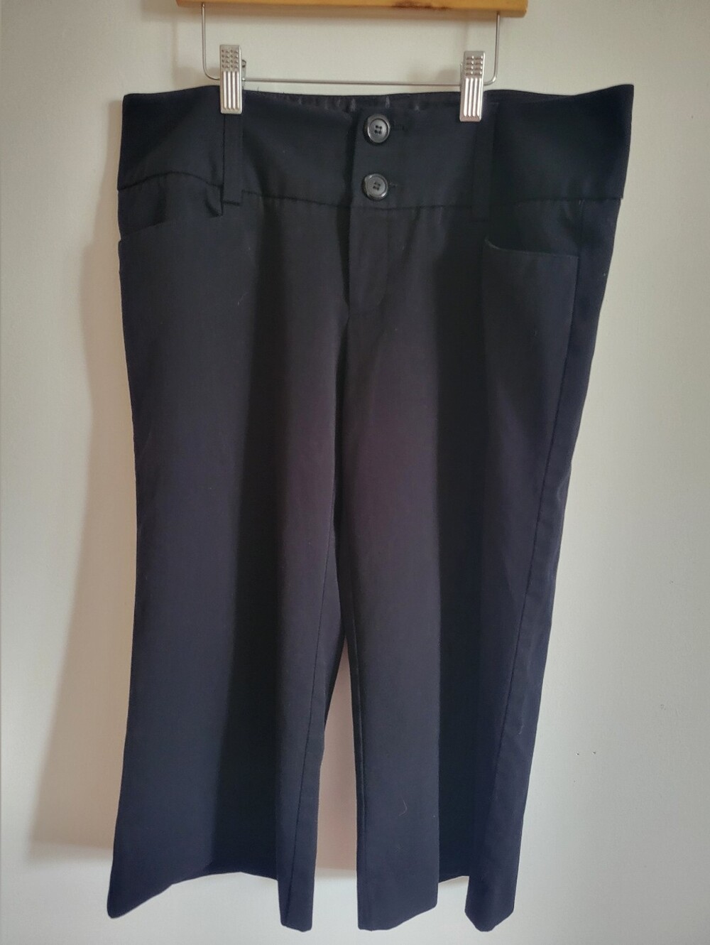 Maurices  black crop dress pants feature a double-button closure